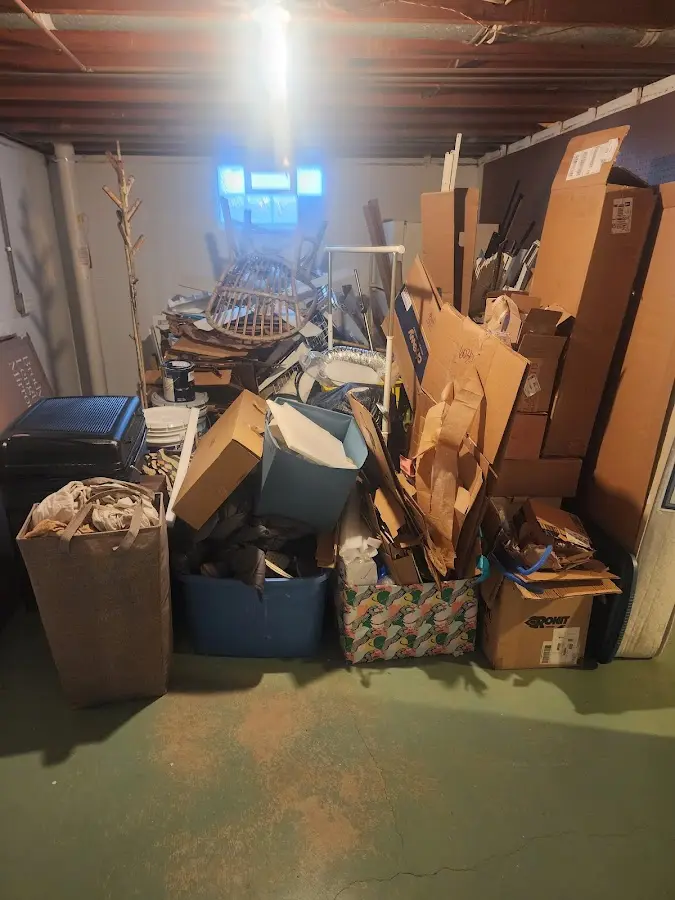 Roll-off dumpster container at job site for Yard Waste Dumpster Rental in Pleasant Hills